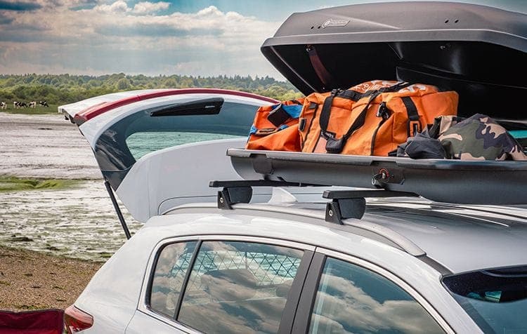 Custom-Fit Car Accessories at DriveDen - SUV with Roof Bars, Roof Mounted Bike Rack and Rubber Boot Mat